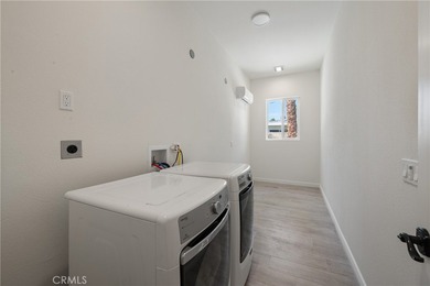 Step into this historic, single-level home in Rancho Mirage on Rancho Las Palmas Country Club in California - for sale on GolfHomes.com, golf home, golf lot