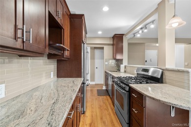Bright and open 1,200 square foot corner apartment with golf on Scarsdale Golf Club in New York - for sale on GolfHomes.com, golf home, golf lot