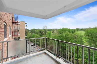 Bright and open 1,200 square foot corner apartment with golf on Scarsdale Golf Club in New York - for sale on GolfHomes.com, golf home, golf lot