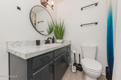 This stunning town home offers true resort-style living--updated on River Bend Golf and Country Club in North Carolina - for sale on GolfHomes.com, golf home, golf lot