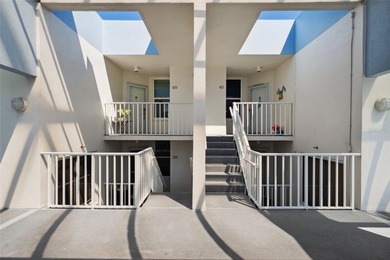 Should I take the convertible or the SUV to the beach today? on Isla Del Sol Yacht and Country Club in Florida - for sale on GolfHomes.com, golf home, golf lot