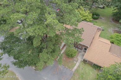 This stunning town home offers true resort-style living--updated on River Bend Golf and Country Club in North Carolina - for sale on GolfHomes.com, golf home, golf lot