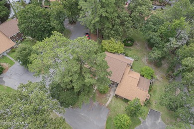 This stunning town home offers true resort-style living--updated on River Bend Golf and Country Club in North Carolina - for sale on GolfHomes.com, golf home, golf lot