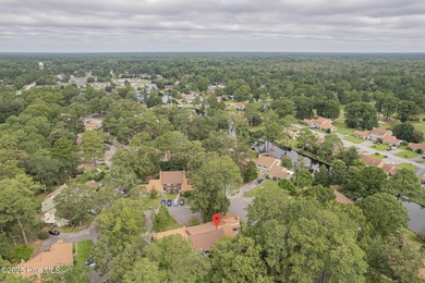 This stunning town home offers true resort-style living--updated on River Bend Golf and Country Club in North Carolina - for sale on GolfHomes.com, golf home, golf lot