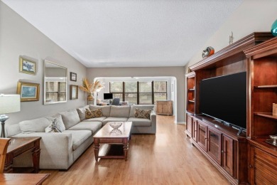 This home is nestled in the active gated community of Boca on Boca Delray Golf and Country Club in Florida - for sale on GolfHomes.com, golf home, golf lot
