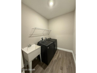 Introducing a brand-new, energy-efficient home available for on LPGA International Golf Course in Florida - for sale on GolfHomes.com, golf home, golf lot
