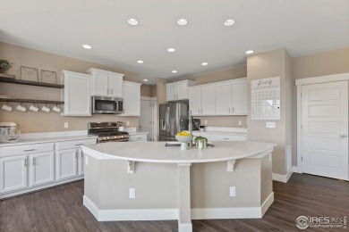 Immaculate and beautifully appointed home, built in 2015, in the on Pelican Lakes Golf and Country Club in Colorado - for sale on GolfHomes.com, golf home, golf lot