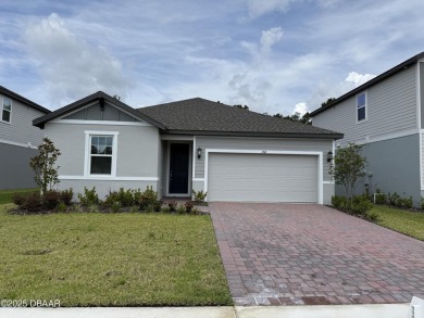 Introducing a brand-new, energy-efficient home available for on LPGA International Golf Course in Florida - for sale on GolfHomes.com, golf home, golf lot