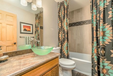 Incredibly beautiful custom home located on the highly manicured on Angel Fire Resort Country Club in New Mexico - for sale on GolfHomes.com, golf home, golf lot