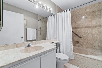 This home is nestled in the active gated community of Boca on Boca Delray Golf and Country Club in Florida - for sale on GolfHomes.com, golf home, golf lot