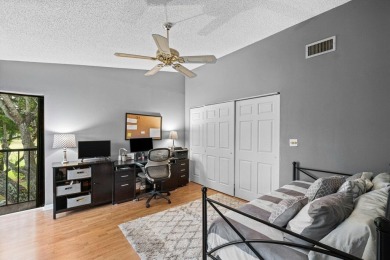 This home is nestled in the active gated community of Boca on Boca Delray Golf and Country Club in Florida - for sale on GolfHomes.com, golf home, golf lot