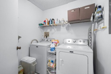 This home is nestled in the active gated community of Boca on Boca Delray Golf and Country Club in Florida - for sale on GolfHomes.com, golf home, golf lot