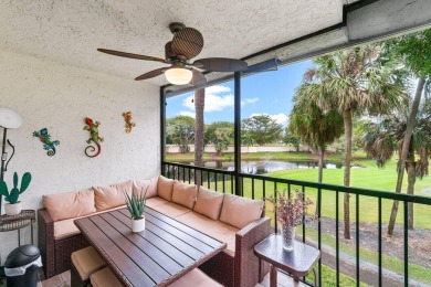 This home is nestled in the active gated community of Boca on Boca Delray Golf and Country Club in Florida - for sale on GolfHomes.com, golf home, golf lot
