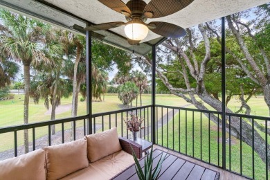This home is nestled in the active gated community of Boca on Boca Delray Golf and Country Club in Florida - for sale on GolfHomes.com, golf home, golf lot