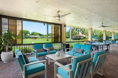 This home is nestled in the active gated community of Boca on Boca Delray Golf and Country Club in Florida - for sale on GolfHomes.com, golf home, golf lot