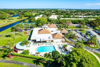 This home is nestled in the active gated community of Boca on Boca Delray Golf and Country Club in Florida - for sale on GolfHomes.com, golf home, golf lot