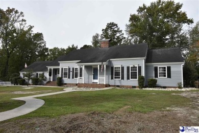 Perfect for the large family. Traditional home located on the on Florence Country Club in South Carolina - for sale on GolfHomes.com, golf home, golf lot