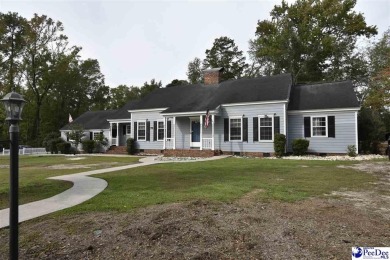 Perfect for the large family. Traditional home located on the on Florence Country Club in South Carolina - for sale on GolfHomes.com, golf home, golf lot