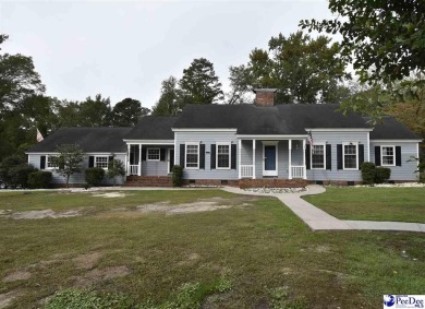 Perfect for the large family. Traditional home located on the on Florence Country Club in South Carolina - for sale on GolfHomes.com, golf home, golf lot