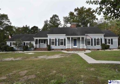 Perfect for the large family. Traditional home located on the on Florence Country Club in South Carolina - for sale on GolfHomes.com, golf home, golf lot