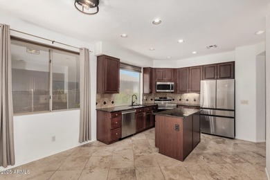 Located in the coveted Estrella Mountain Ranch community, this on Estrella Mountain Ranch Golf Course in Arizona - for sale on GolfHomes.com, golf home, golf lot