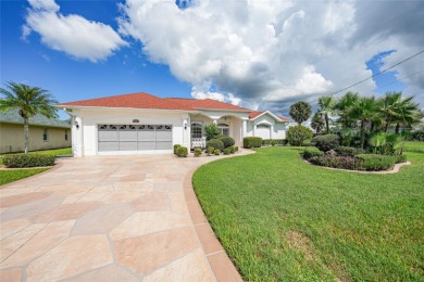 Explore this EXPANSIVE residence featuring a SPLIT BEDROOM on Pinemoor West Golf Club in Florida - for sale on GolfHomes.com, golf home, golf lot