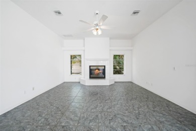 Explore this EXPANSIVE residence featuring a SPLIT BEDROOM on Pinemoor West Golf Club in Florida - for sale on GolfHomes.com, golf home, golf lot