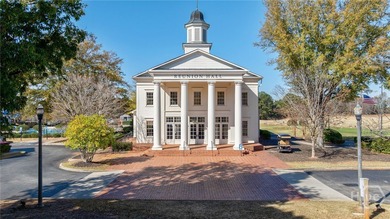 Inviting and charming, the rocking-chair brick front porch on Reunion Golf Club in Georgia - for sale on GolfHomes.com, golf home, golf lot