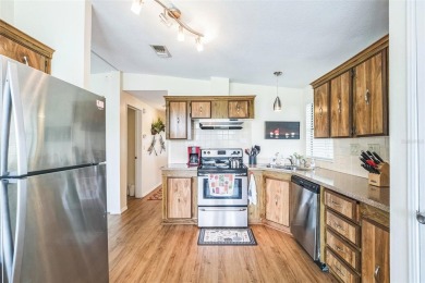 This 2-bedroom, 2-bathroom manufactured home in The Villages on Stonecrest Golf and Club Club in Florida - for sale on GolfHomes.com, golf home, golf lot