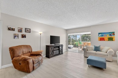 STUNNING FULLY RENOVATED 2 BEDROOM 2 BATH CONDO BOASTING 1800 SQ on  in Florida - for sale on GolfHomes.com, golf home, golf lot