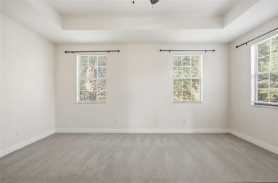 Experience luxury living in this stunning 3-bedroom, 2.5-bath on Eagle Creek Golf Club in Florida - for sale on GolfHomes.com, golf home, golf lot