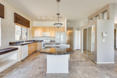 Golf course living at its finest in the highly sought-after on Western Skies Golf Club in Arizona - for sale on GolfHomes.com, golf home, golf lot