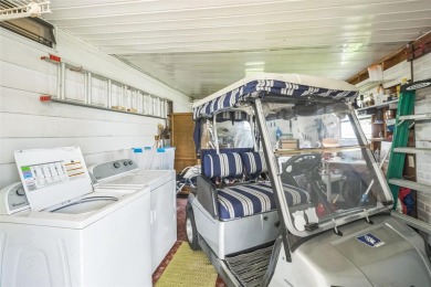 This 2-bedroom, 2-bathroom manufactured home in The Villages on Stonecrest Golf and Club Club in Florida - for sale on GolfHomes.com, golf home, golf lot