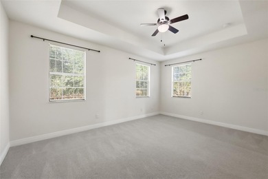 Experience luxury living in this stunning 3-bedroom, 2.5-bath on Eagle Creek Golf Club in Florida - for sale on GolfHomes.com, golf home, golf lot