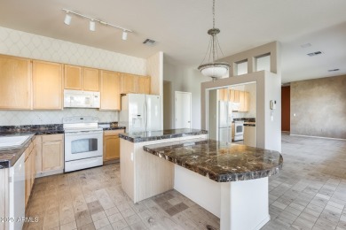 Golf course living at its finest in the highly sought-after on Western Skies Golf Club in Arizona - for sale on GolfHomes.com, golf home, golf lot