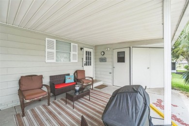 This 2-bedroom, 2-bathroom manufactured home in The Villages on Stonecrest Golf and Club Club in Florida - for sale on GolfHomes.com, golf home, golf lot