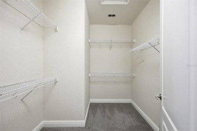 Experience luxury living in this stunning 3-bedroom, 2.5-bath on Eagle Creek Golf Club in Florida - for sale on GolfHomes.com, golf home, golf lot