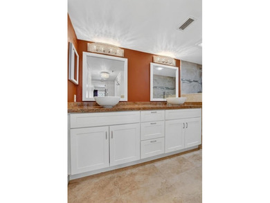 STUNNING FULLY RENOVATED 2 BEDROOM 2 BATH CONDO BOASTING 1800 SQ on  in Florida - for sale on GolfHomes.com, golf home, golf lot