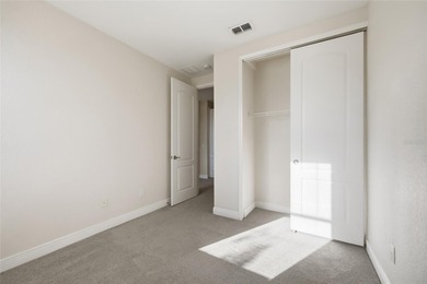 Experience luxury living in this stunning 3-bedroom, 2.5-bath on Eagle Creek Golf Club in Florida - for sale on GolfHomes.com, golf home, golf lot