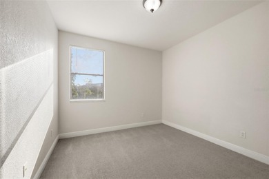 Experience luxury living in this stunning 3-bedroom, 2.5-bath on Eagle Creek Golf Club in Florida - for sale on GolfHomes.com, golf home, golf lot