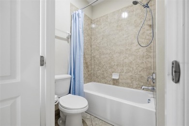 Experience luxury living in this stunning 3-bedroom, 2.5-bath on Eagle Creek Golf Club in Florida - for sale on GolfHomes.com, golf home, golf lot