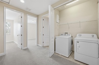 Experience luxury living in this stunning 3-bedroom, 2.5-bath on Eagle Creek Golf Club in Florida - for sale on GolfHomes.com, golf home, golf lot