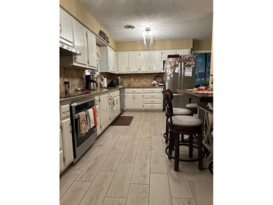 Very nice, well kept home in Golf Links subdivision.  Laminate on Blytheville Country Club in Arkansas - for sale on GolfHomes.com, golf home, golf lot