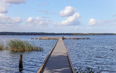 This meticulously updated and maintained home in the highly on Eagle Harbor Golf Club in Florida - for sale on GolfHomes.com, golf home, golf lot