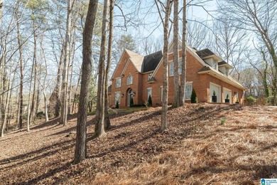 Tucked away on a private 1.15-acre lot in desirable Riverchase on Riverchase Country Club in Alabama - for sale on GolfHomes.com, golf home, golf lot