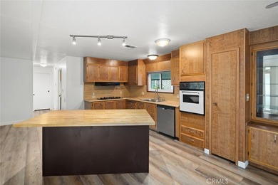 Welcome to this beautifully updated and move-in ready home in on Chalk Mountain Golf Course in California - for sale on GolfHomes.com, golf home, golf lot