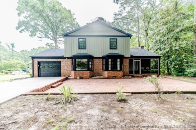 Welcome to 225 Lakeview Drive - a beautifully updated 2-story on Carolina Trace Country Club in North Carolina - for sale on GolfHomes.com, golf home, golf lot