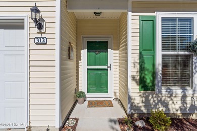 Welcome to this stunning townhouse-style condo, being sold fully on Carolina Shores Golf Course in North Carolina - for sale on GolfHomes.com, golf home, golf lot