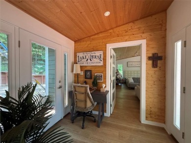 Wonderful modern style home in the piney woods of east Texas on Pine Dunes Golf Course in Texas - for sale on GolfHomes.com, golf home, golf lot