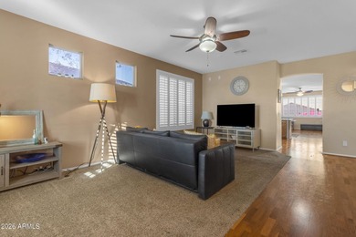 Single-level home with a Large courtyard at the entrance and an on Estrella Mountain Ranch Golf Course in Arizona - for sale on GolfHomes.com, golf home, golf lot